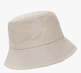 Beige bucket hat on a white background